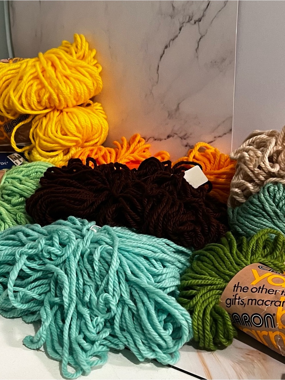 Carin and Murphy’s Rug Skeins Assortment in Yellow, Turquoise, Green, Brown, Tan